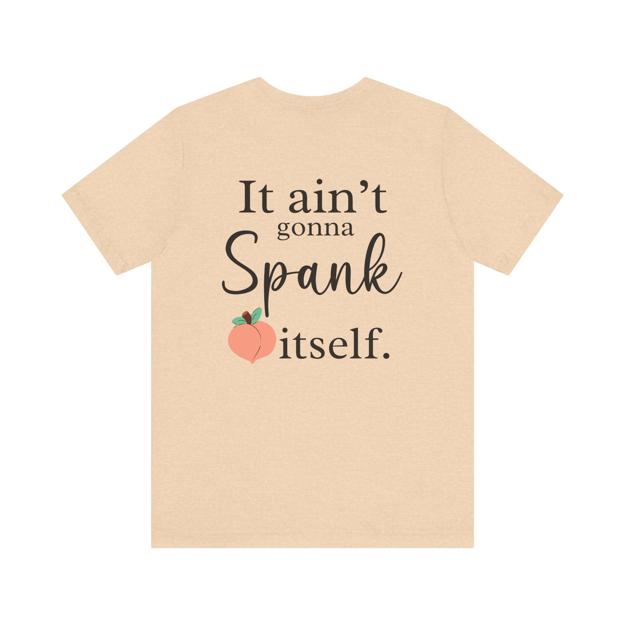 Beige t-shirt with text and peach graphic on a white background