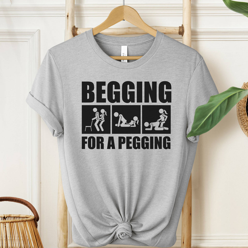 Begging For A Pegging T-Shirt in Athletic Heather gray with bold black graphic print, unisex adult humor shirt.