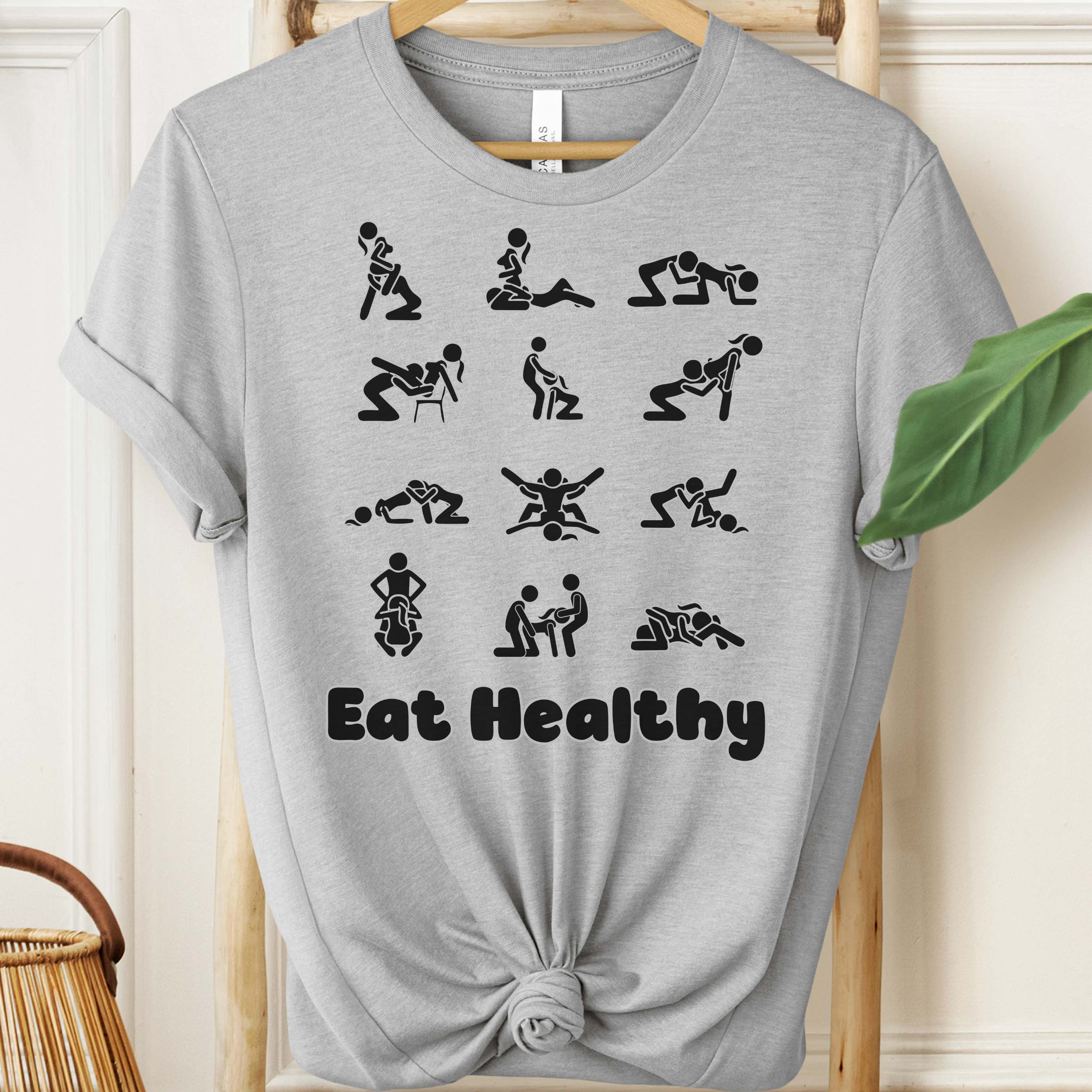 Eat Healthy adult humor t-shirt with black graphic icons on heather fabric