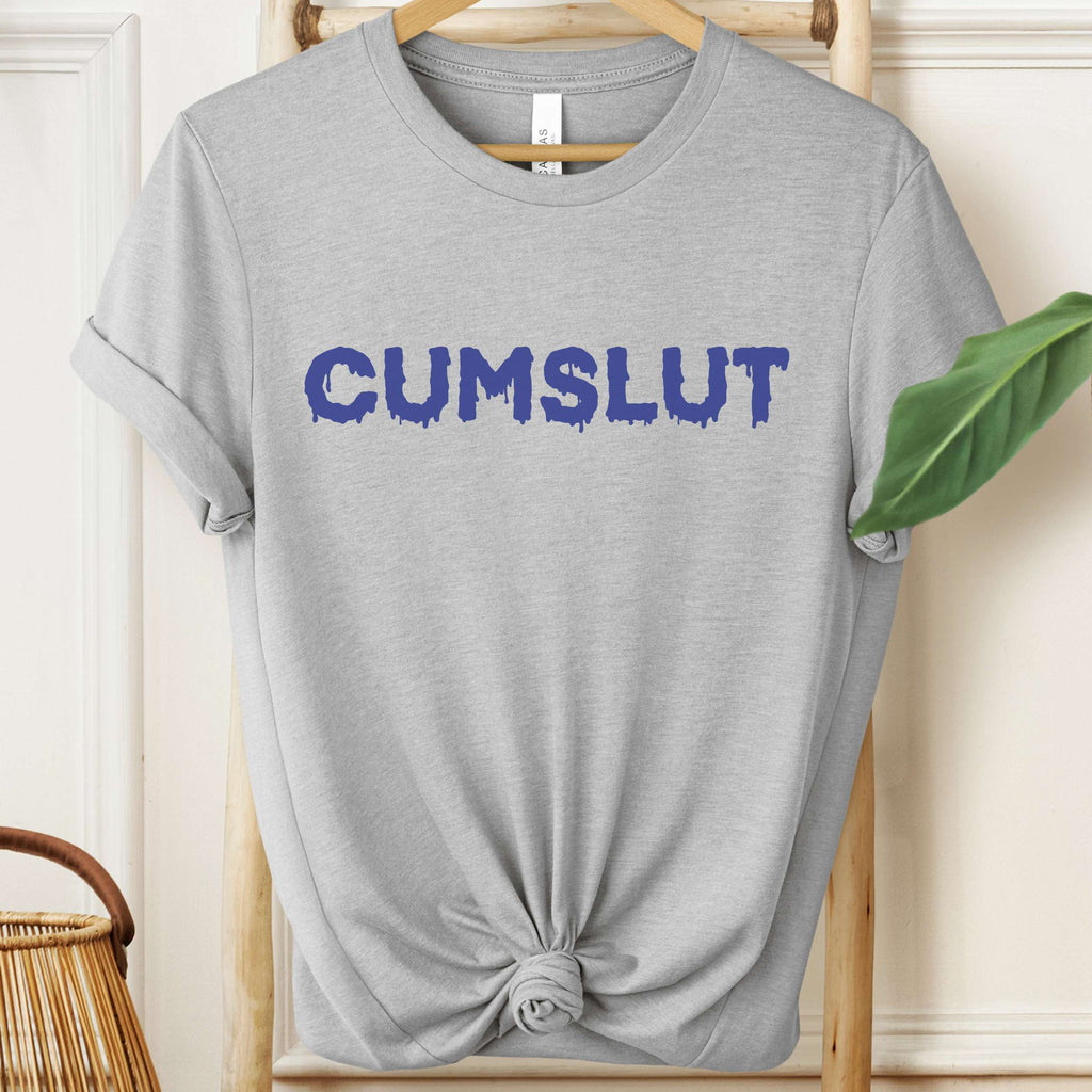 Gray t-shirt with 'CUMSLUT' printed in blue on a hanger.