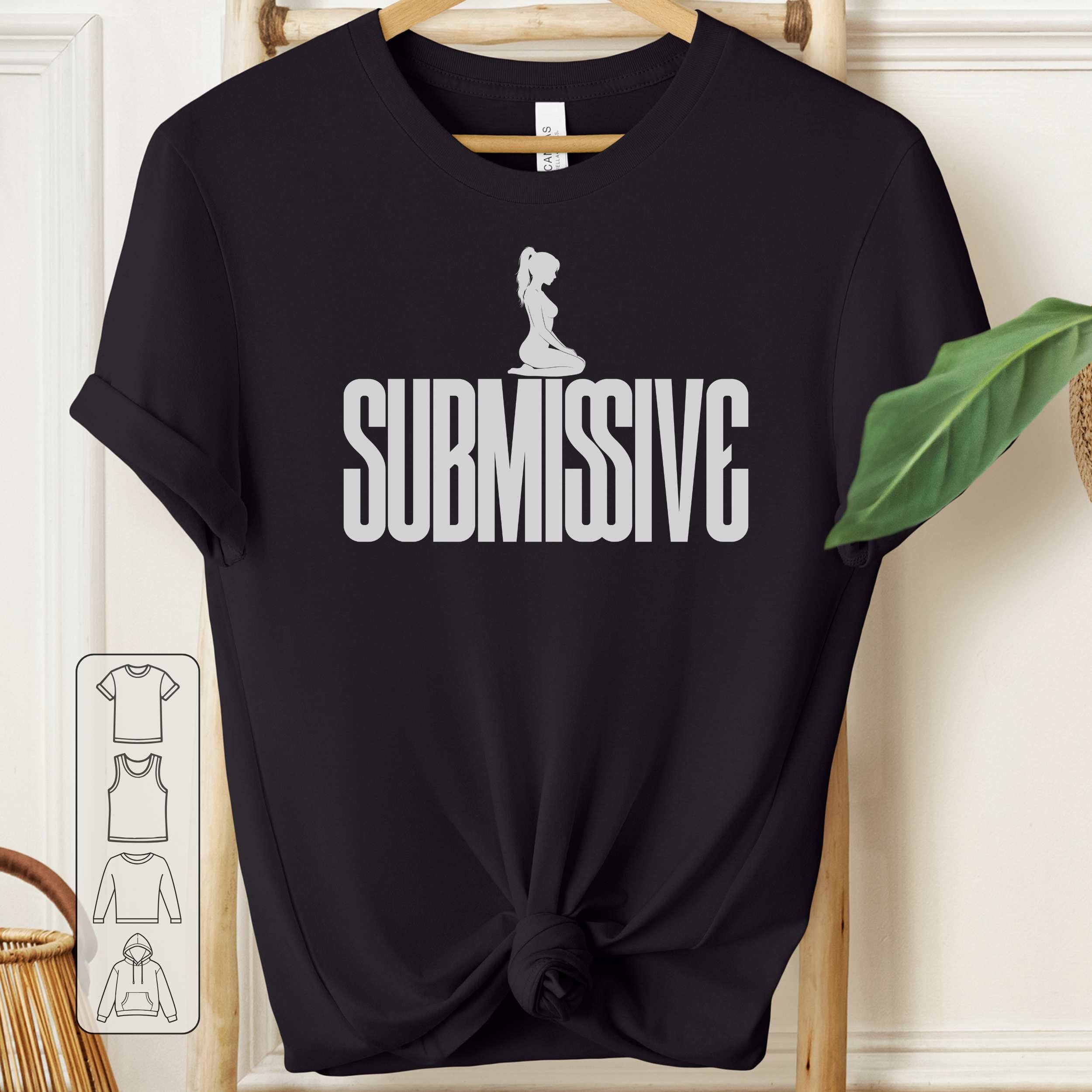 Black t-shirt with 'SUBMISSIVE' text and graphic on a hanger.