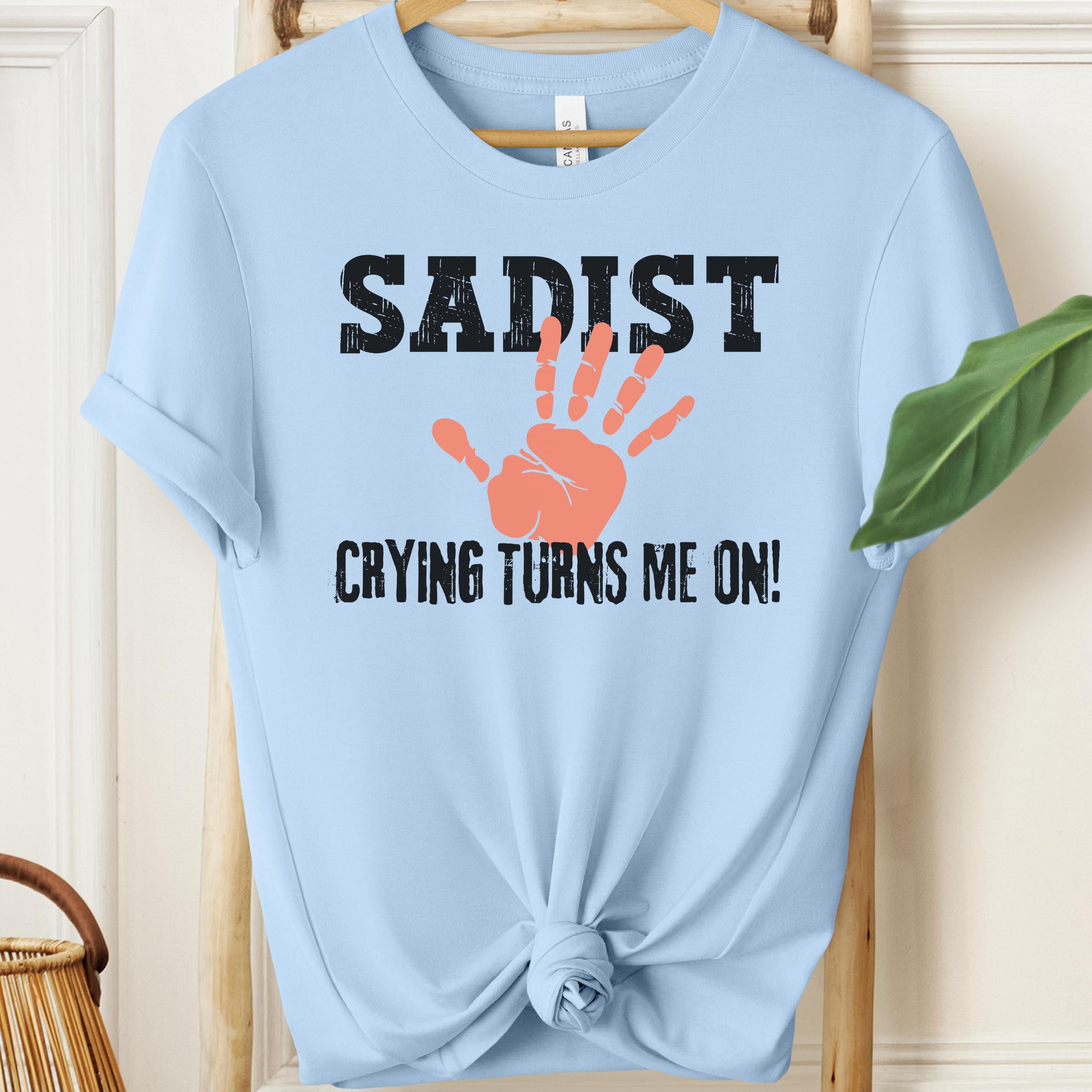 Light blue adult humour shirt with sadist slogan and bold handprint