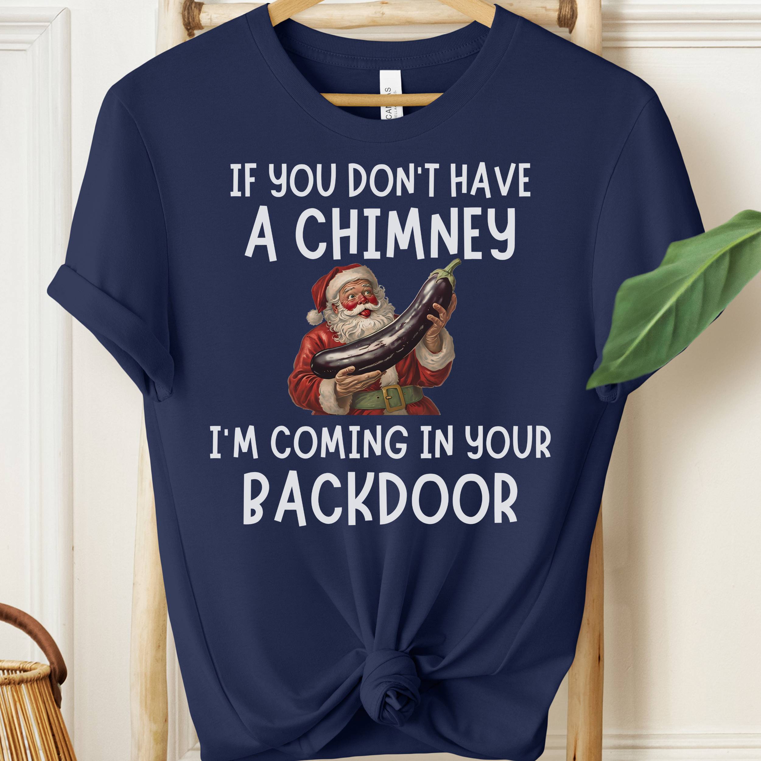 Navy blue t-shirt with Santa Claus graphic and humorous text on a white background