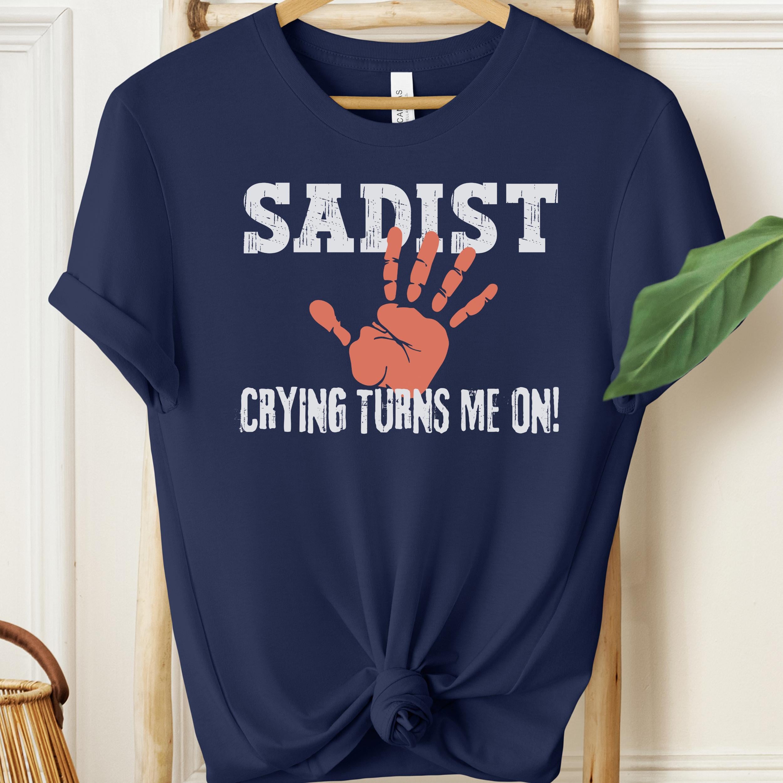 Navy Blue shirt with “Sadist – Crying Turns Me On” graphic and red handprint design