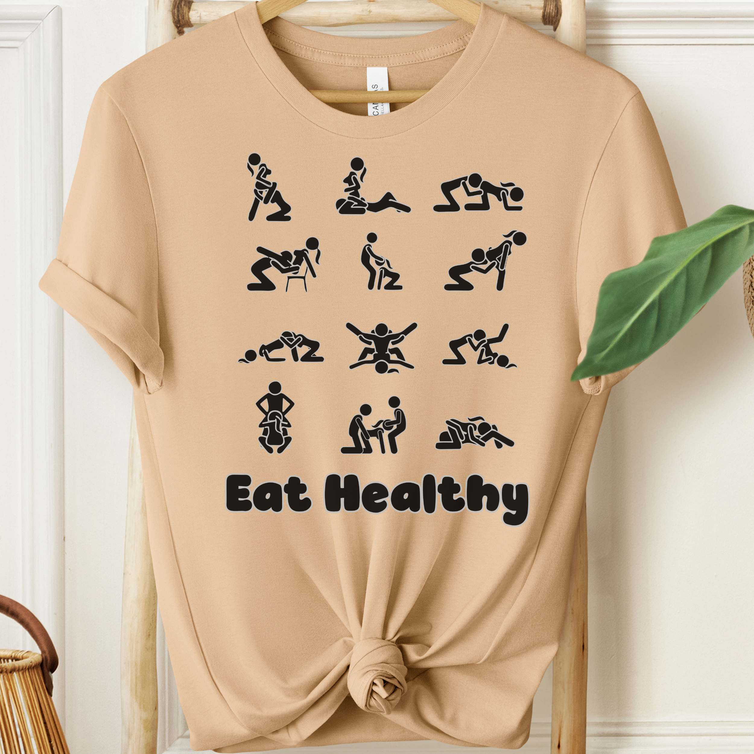 Eat Healthy adult humor t-shirt with black graphic icons on heather fabric