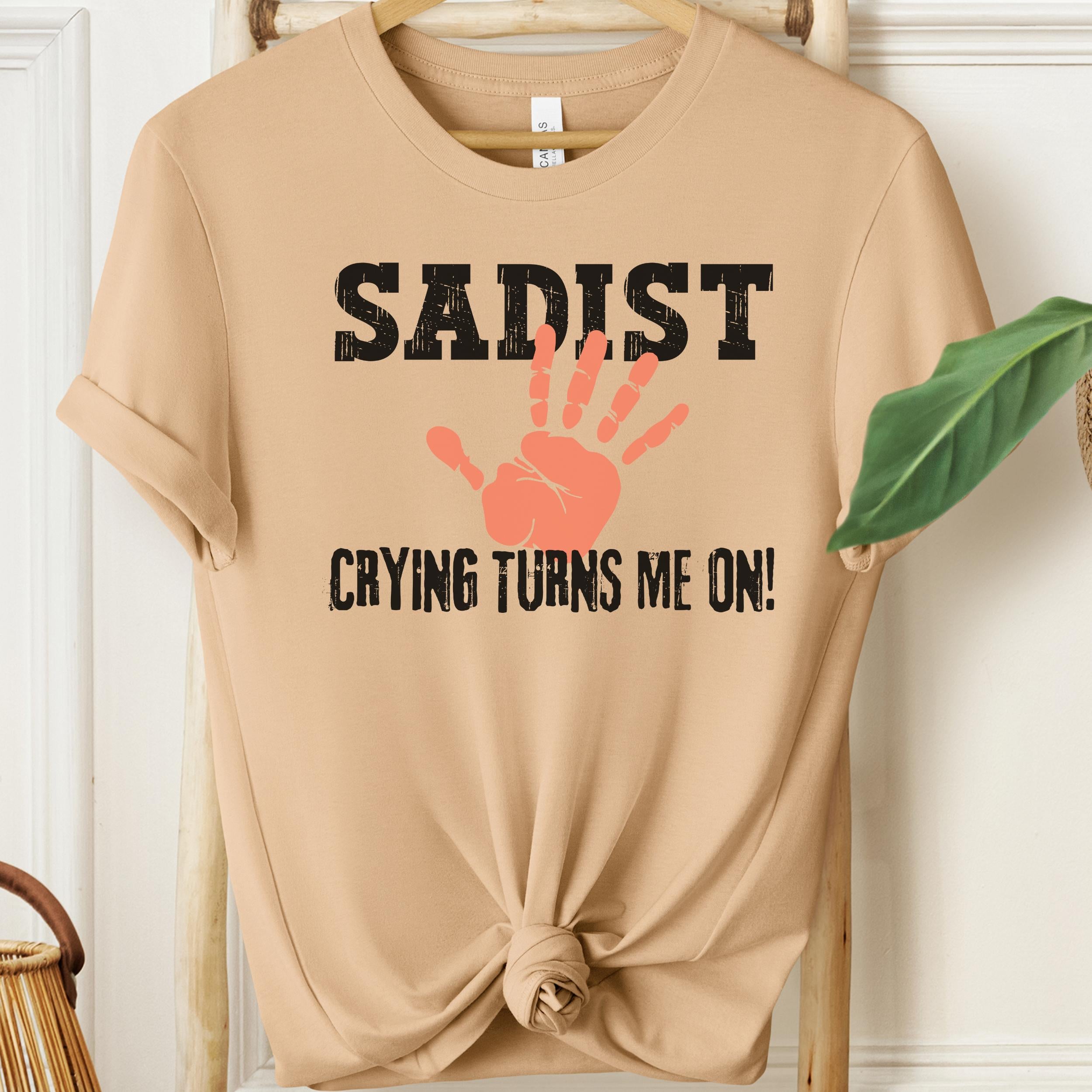 Sand-coloured shirt with edgy sadist slogan and handprint illustration