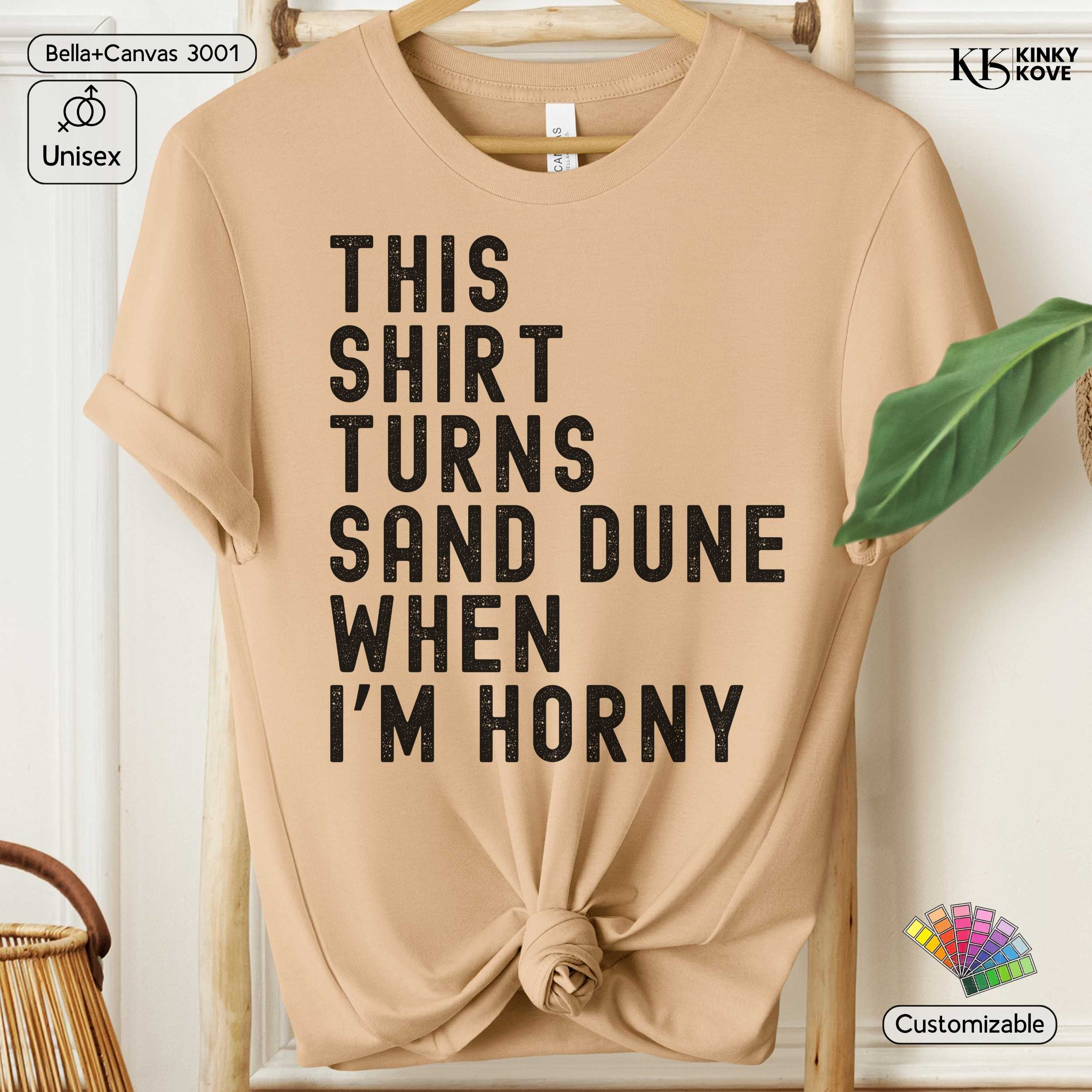 Beige t-shirt with humorous text on a hanger against a white background