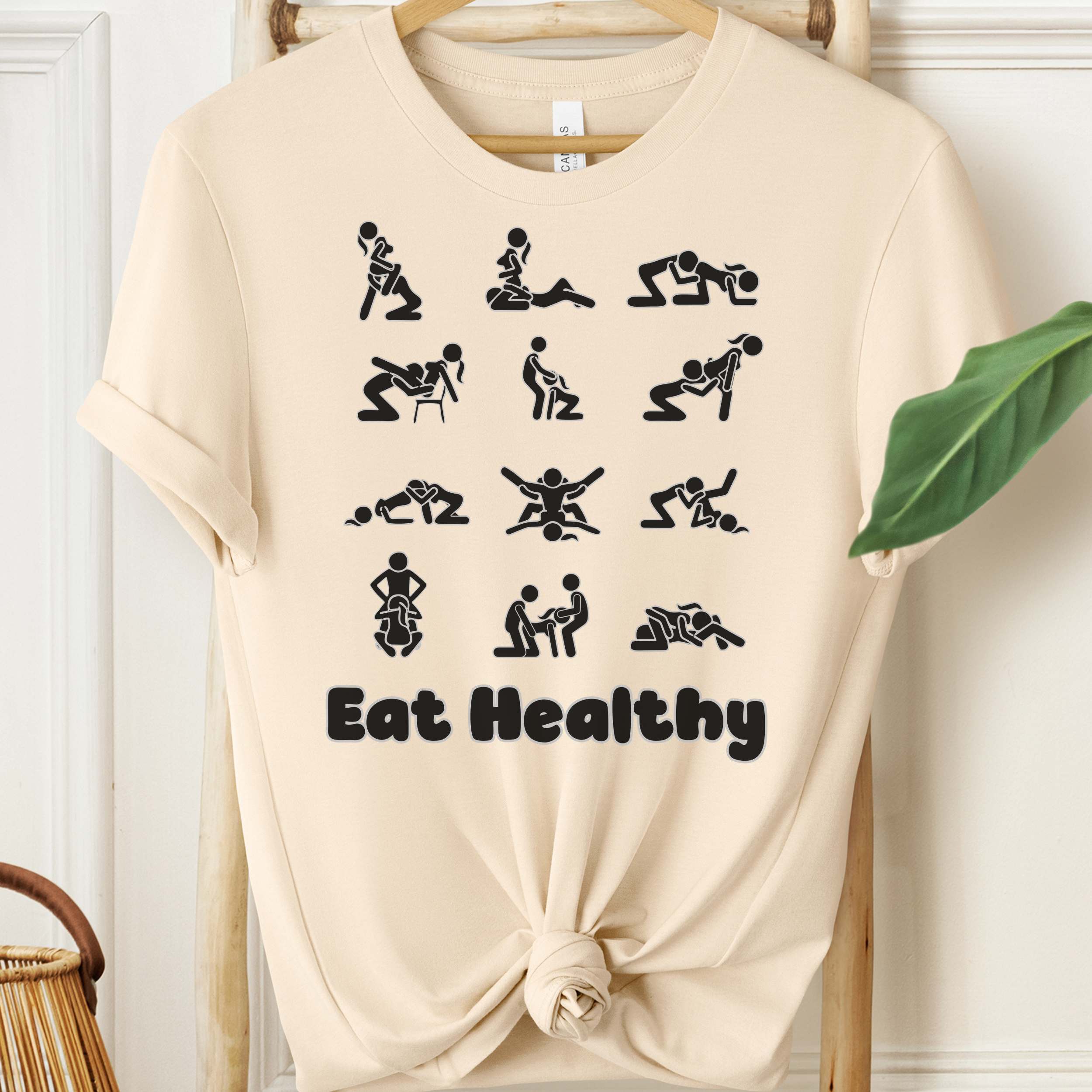 Eat Healthy adult humor t-shirt with black graphic icons on heather fabric