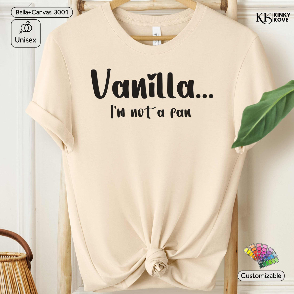 A cream-colored short-sleeve t-shirt with rolled sleeves, featuring the text 'Vanilla.