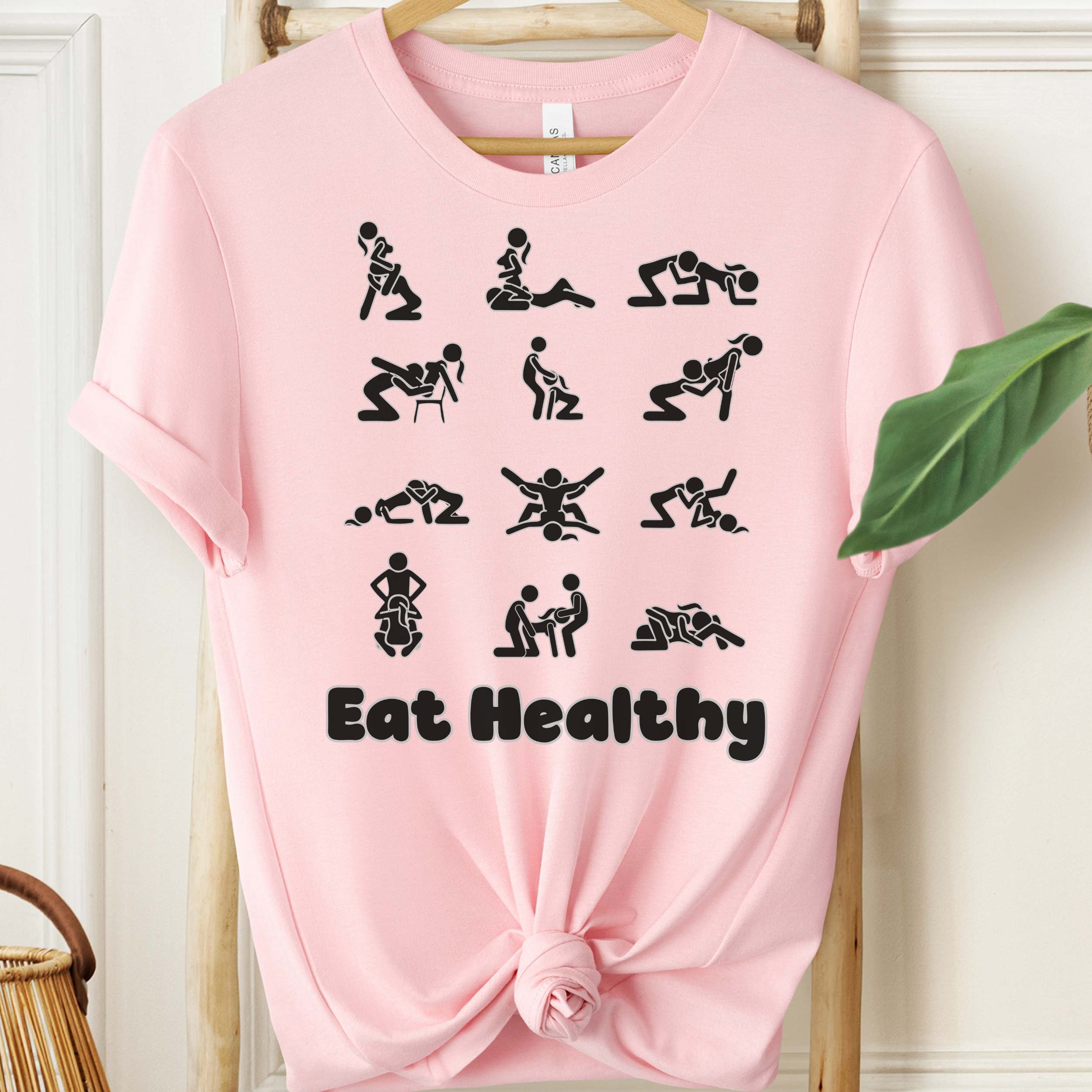 Eat Healthy adult humor t-shirt with black graphic icons on heather fabric
