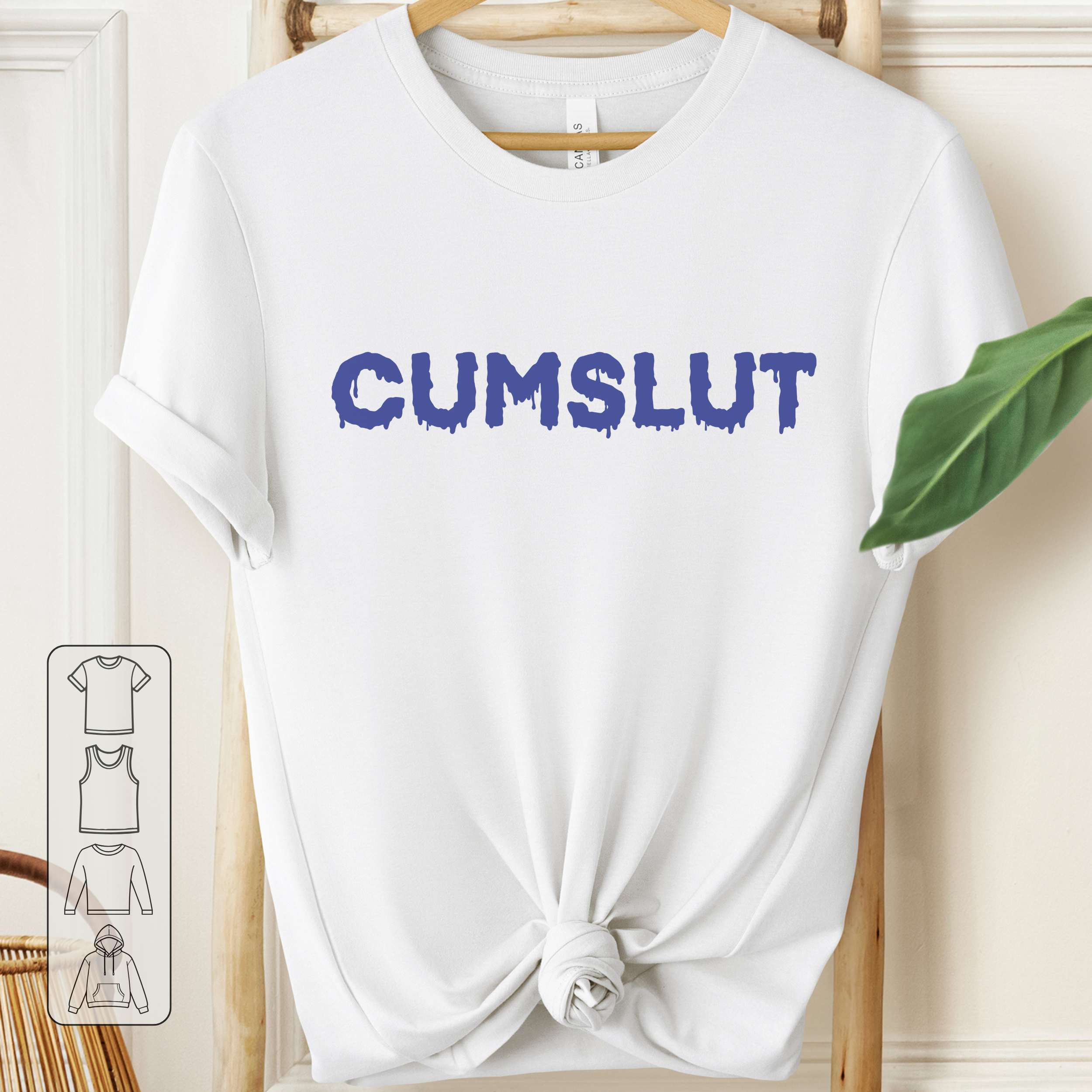 White t-shirt with 'CUMSLUT' printed in blue on a wooden hanger.
