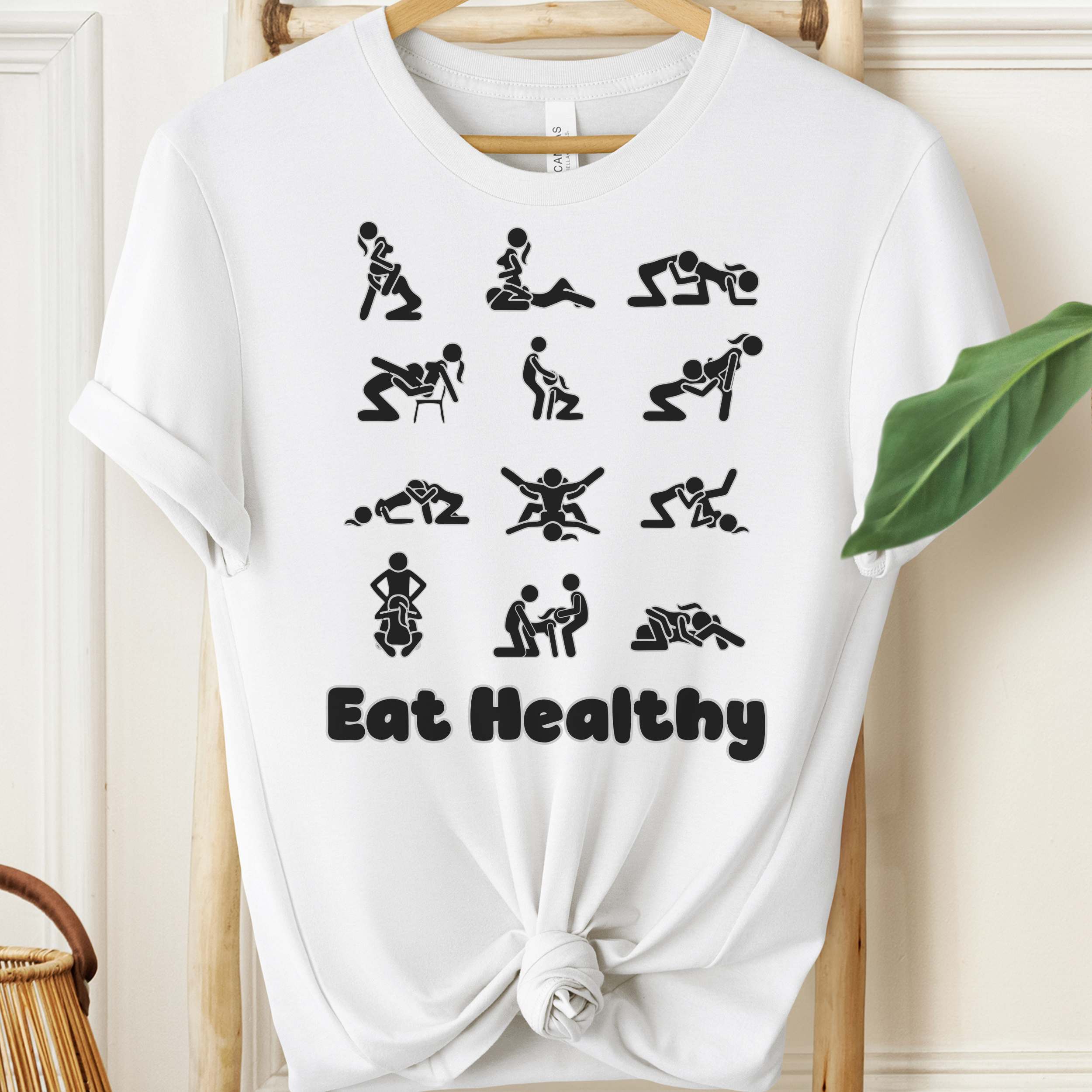 Eat Healthy adult humor t-shirt with black graphic icons on heather fabric