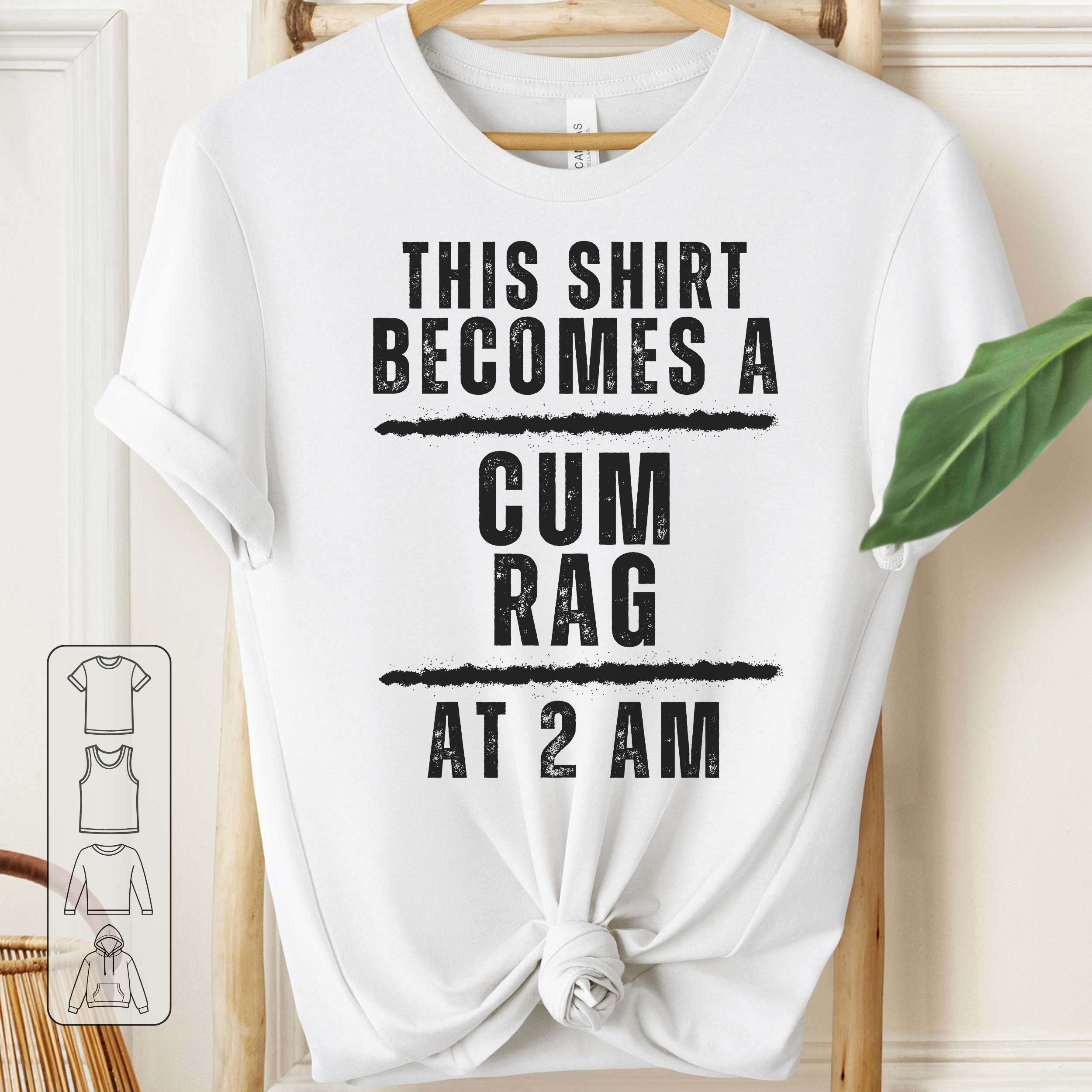 White t-shirt with black text on a wooden hanger against a white background