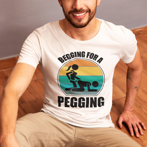 Man wearing a white t-shirt with a graphic design and text.