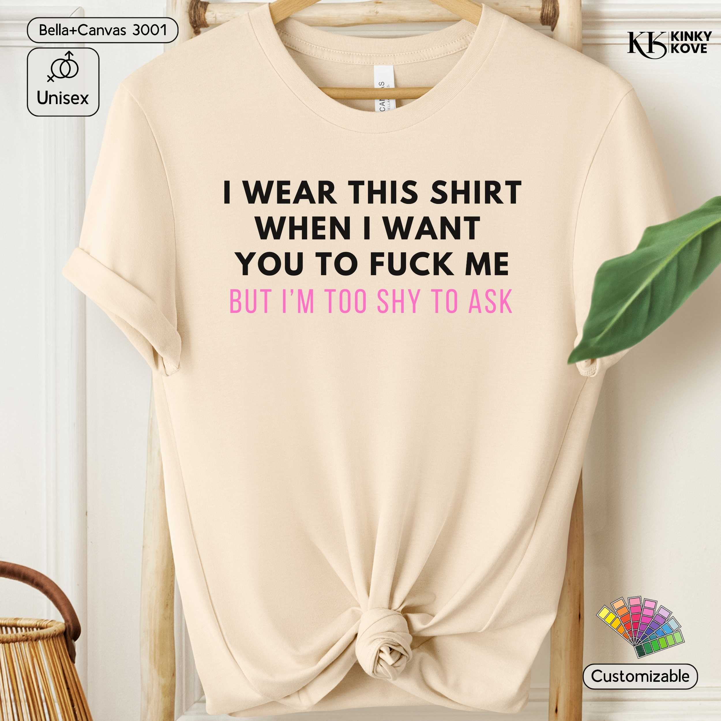 Beige t-shirt with text on a hanger, Kinky Kove brand visible
