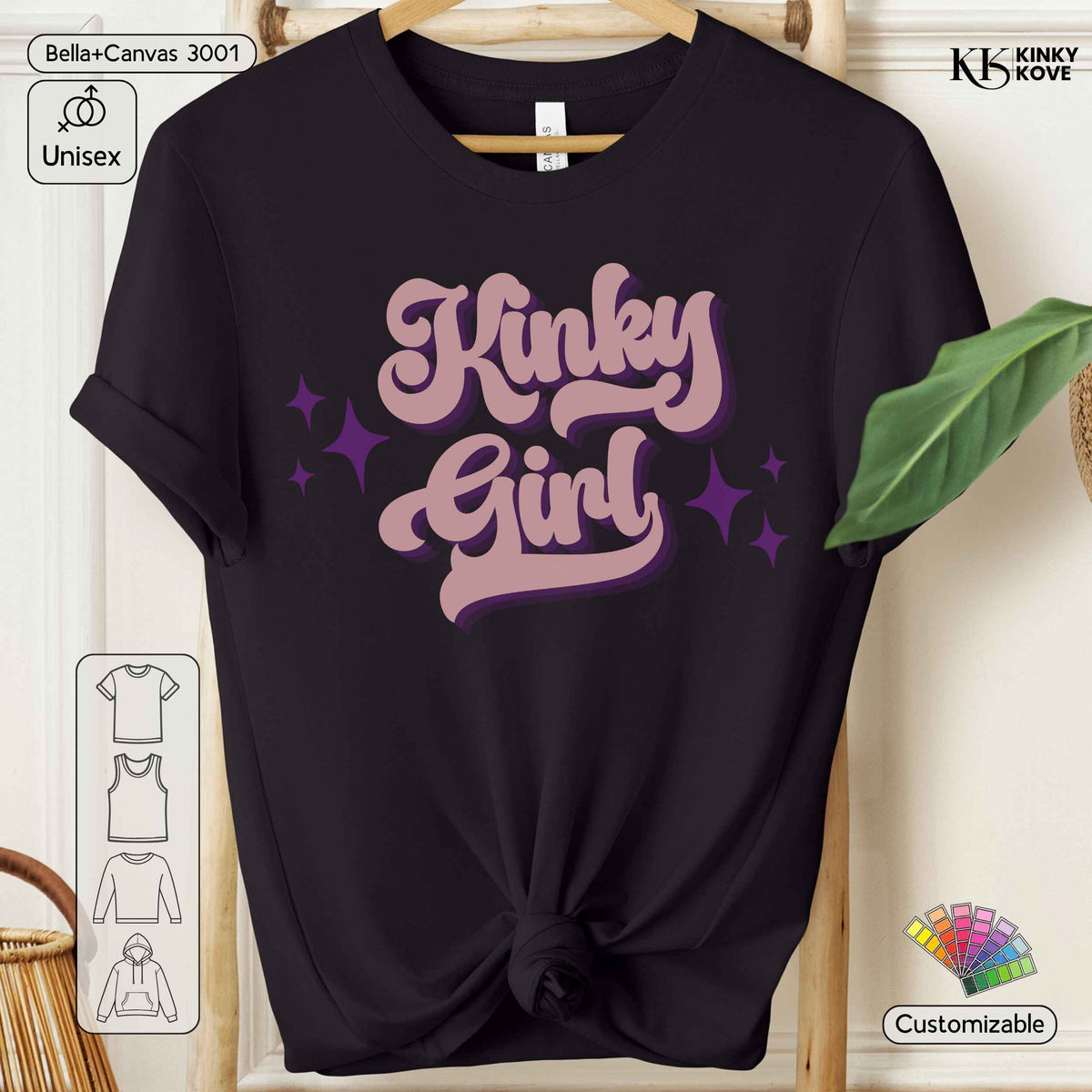 A black short-sleeve t-shirt hanging on a wooden hanger, featuring a retro-style pink and purple graphic that reads 'Kinky Girl' with star accents. The image includes various digital overlays such as 'Bella+Canvas 3001', 'Unisex', 'KINKY KOVE', and 'Customizable' icons.