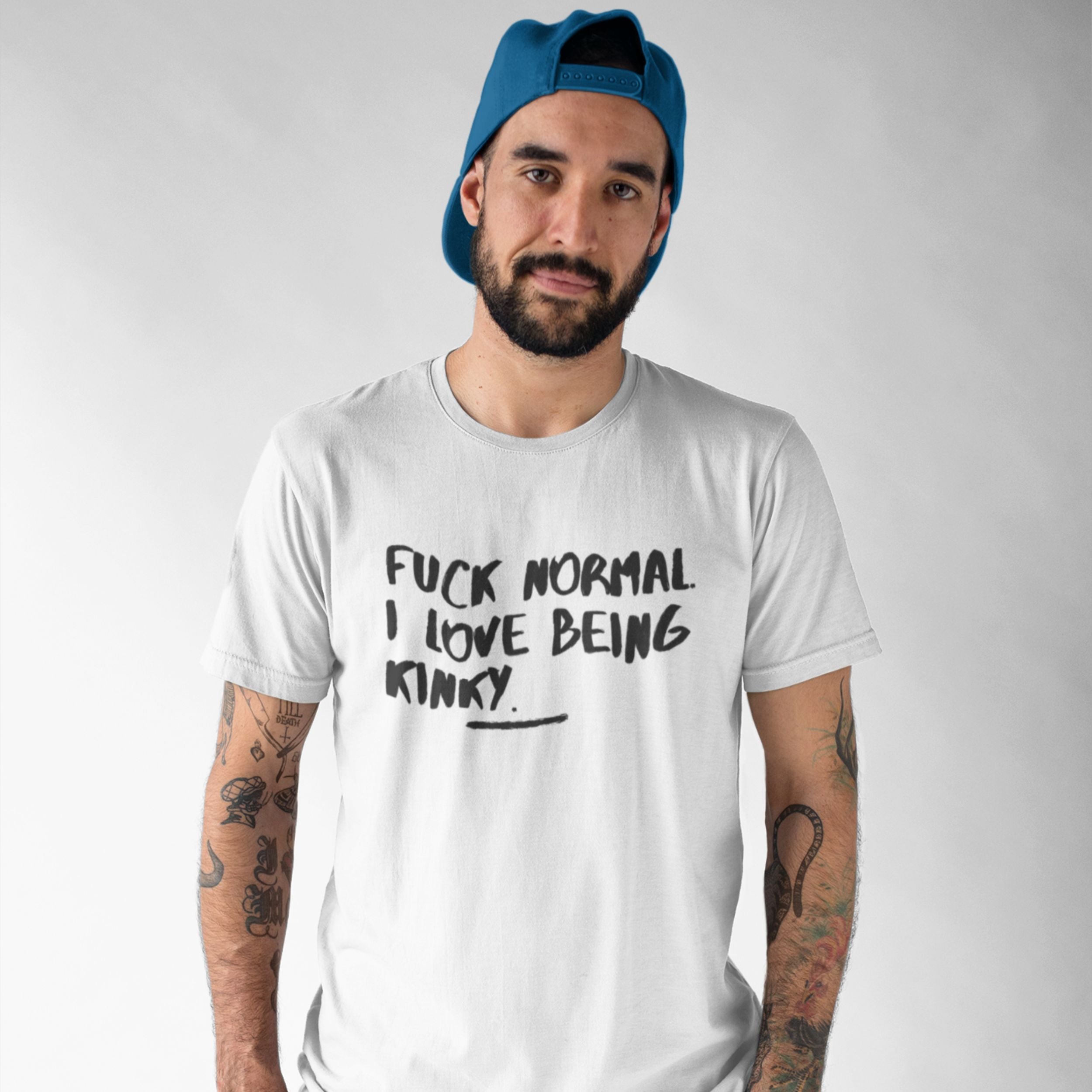 White T-shirt with black “Fuck Normal I Love Being Kinky” text graphic.